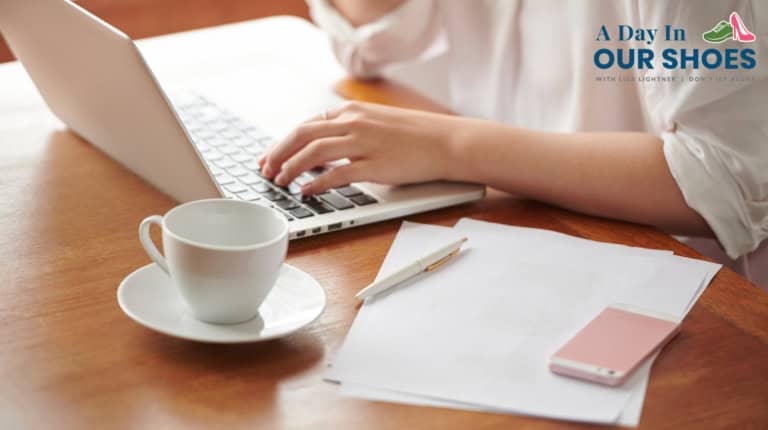 Person typing on a laptop at a wooden table with coffee, papers, a pen, and a pink smartphone; “a day in our shoes” logo in the top right corner, perfect for learning how to request an iep evaluation.