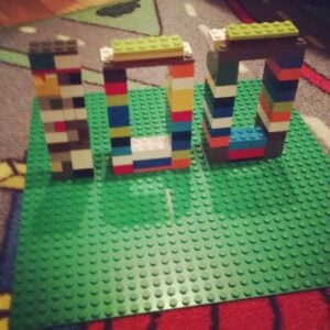 A set of lego blocks with 100 spelled out in 100 lego bricks, perfect for incorporating into your 100 days of school ideas.