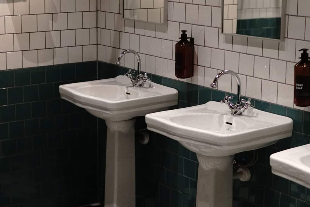 3 sample student toilet protocols for an iep (pdf) 3 Two white pedestal sinks with chrome faucets set against a tiled wall, with liquid soap dispensers mounted above each sink, follow toilet protocol for iep.