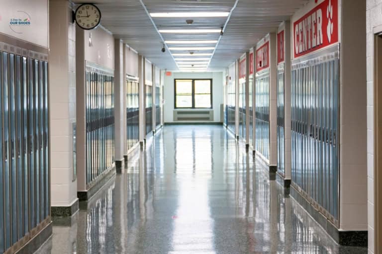 An empty school hallway in the early morning.