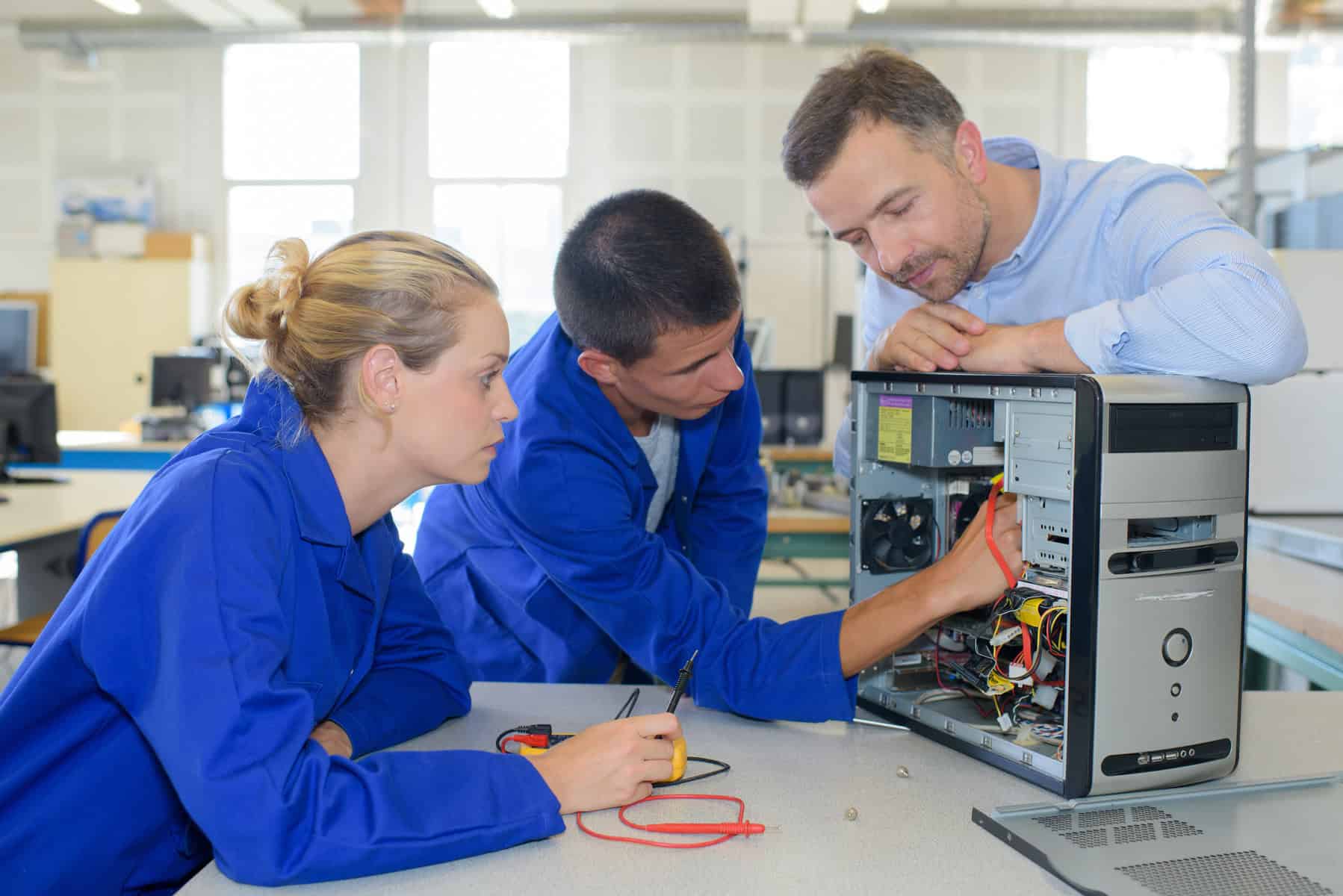 Vocational teacher instructing two iep students as part of indicator 13 responsibilities