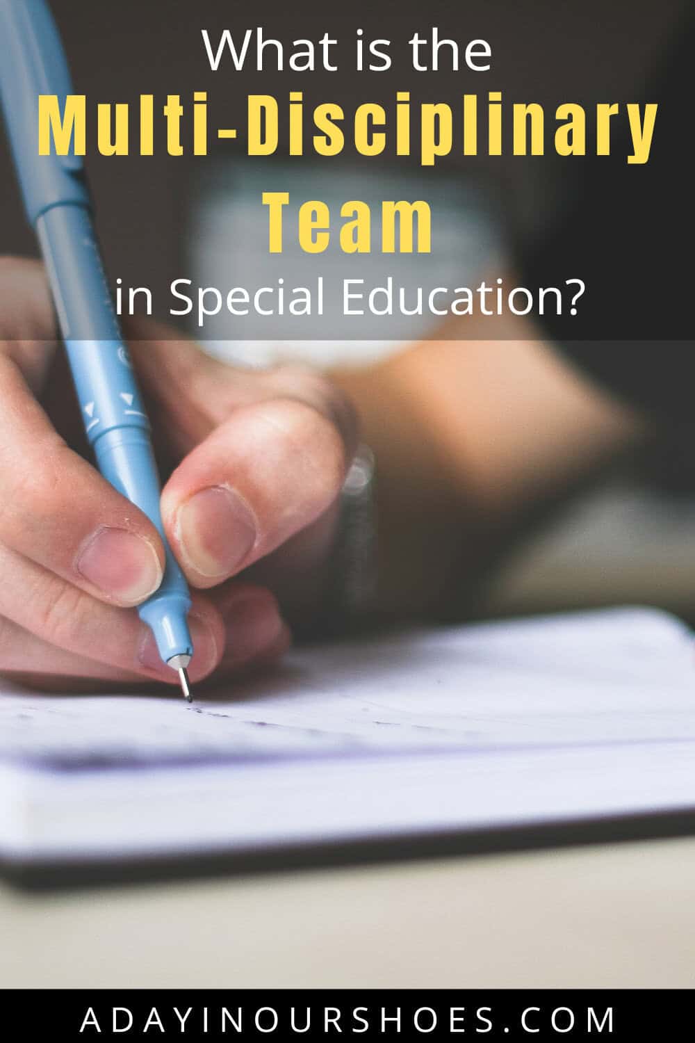 A hand holding a blue pen writing on paper with text overlay: "what is the role of the multidisciplinary team in special education?