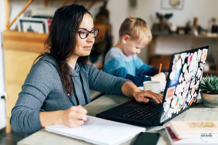 Parent reviewing paperwork at a table before an iep meeting
