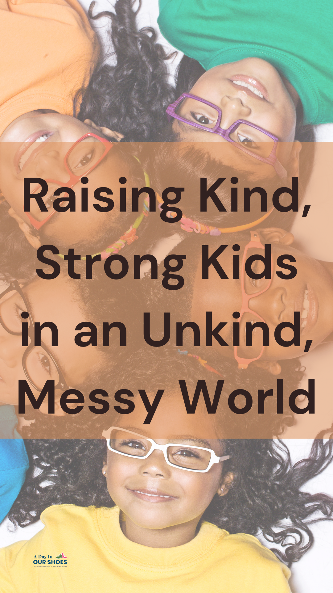 Six kind kids wearing colorful glasses lie in a circle, smiling, with the text "raising kind, strong kids in an unkind, messy world" overlaid—a heartwarming image celebrating parenting and the power of raising compassionate children.