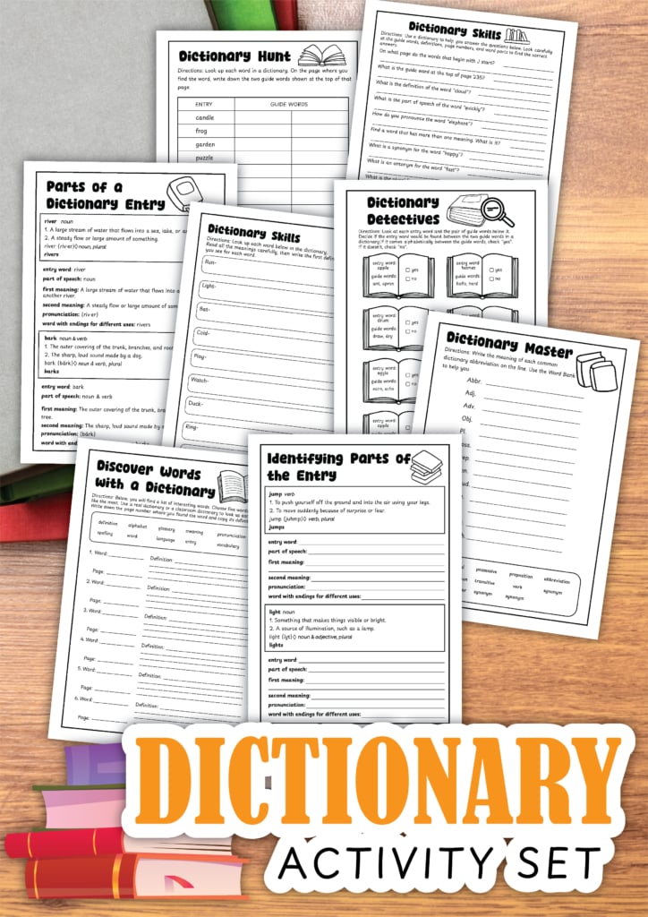 A set of printed worksheets titled "dictionary activity set," designed for teaching kids essential dictionary skills, is spread out on a wooden surface with some colored pencils.