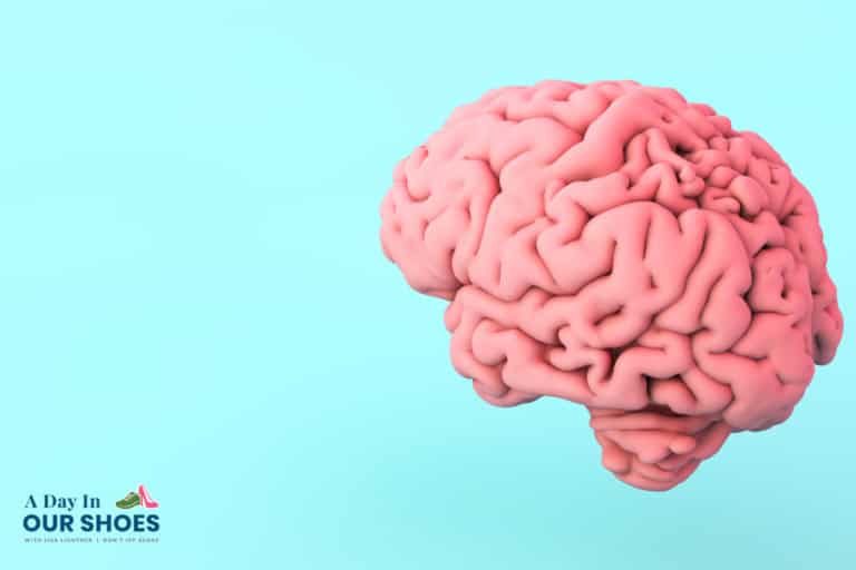 A realistic 3d illustration of a human brain on a light blue background, highlighting the theme of cognitive impairment, with the text "a day in our shoes" in the lower left corner.