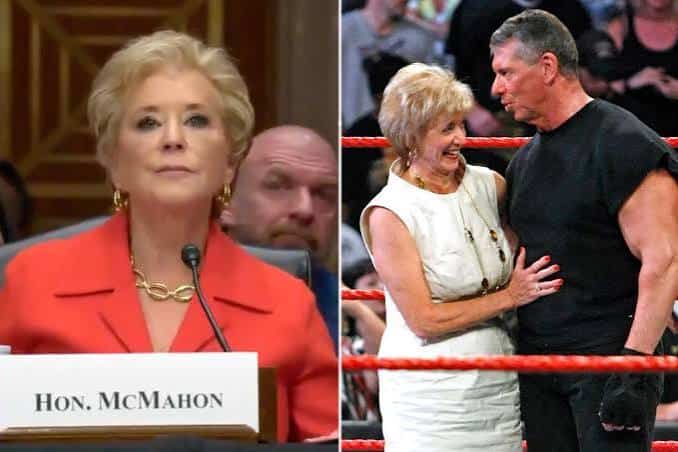 Linda mcmahon speaking at a formal event with a serious expression.