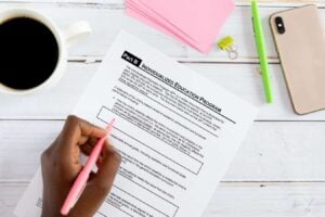 Mom reviewing her iep with a cup of coffee