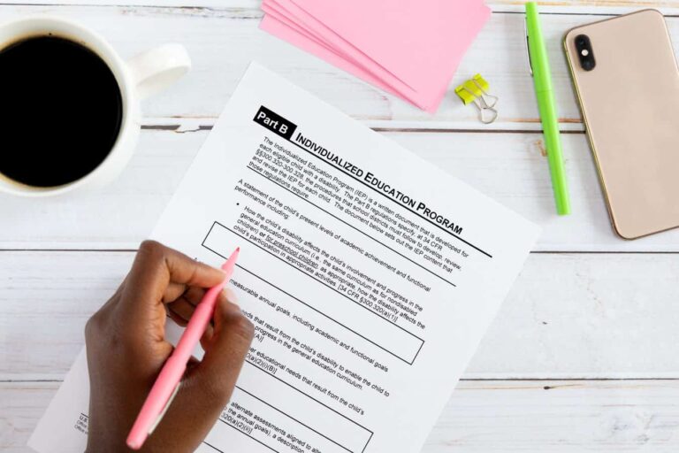 Mom reviewing her iep with a cup of coffee