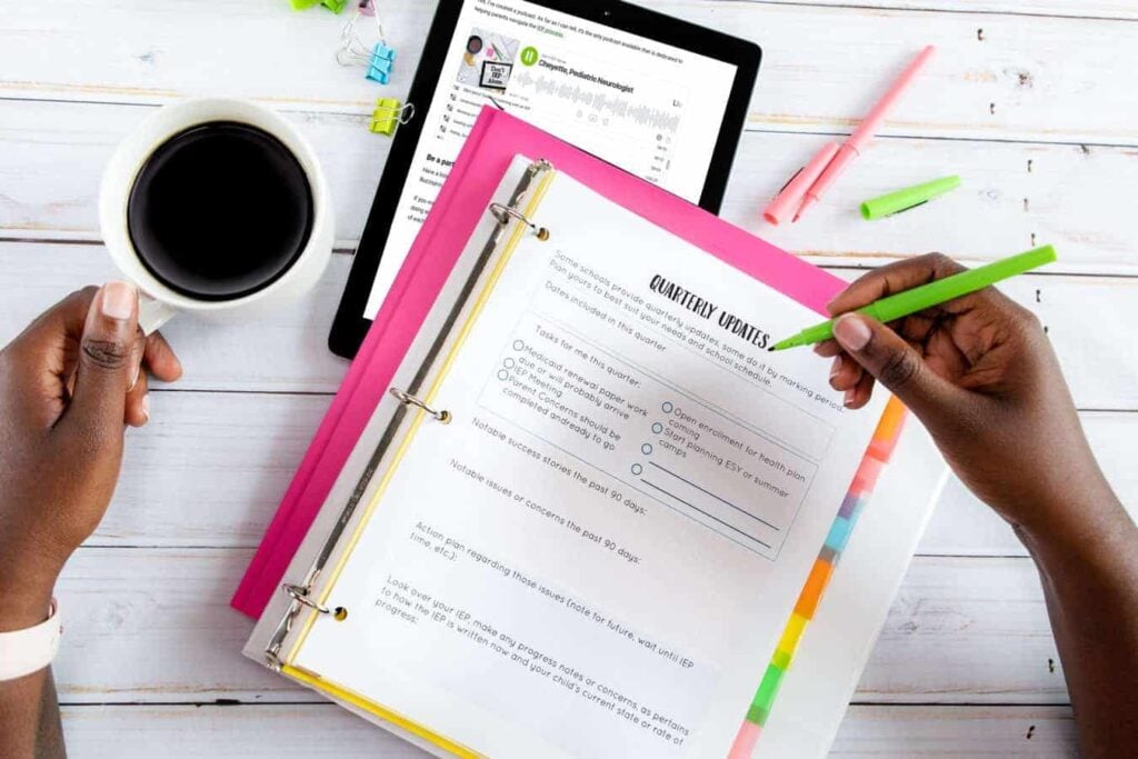 Mom having coffee and doing quarterly updates iep binder