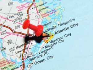 Pin pointing to family friendly atlantic city on a map.