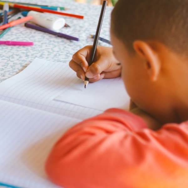 Child learning and practicing his temporal words