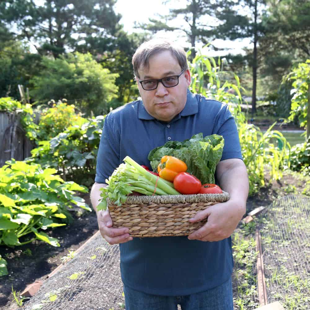 Disabled adult carrying vegetables