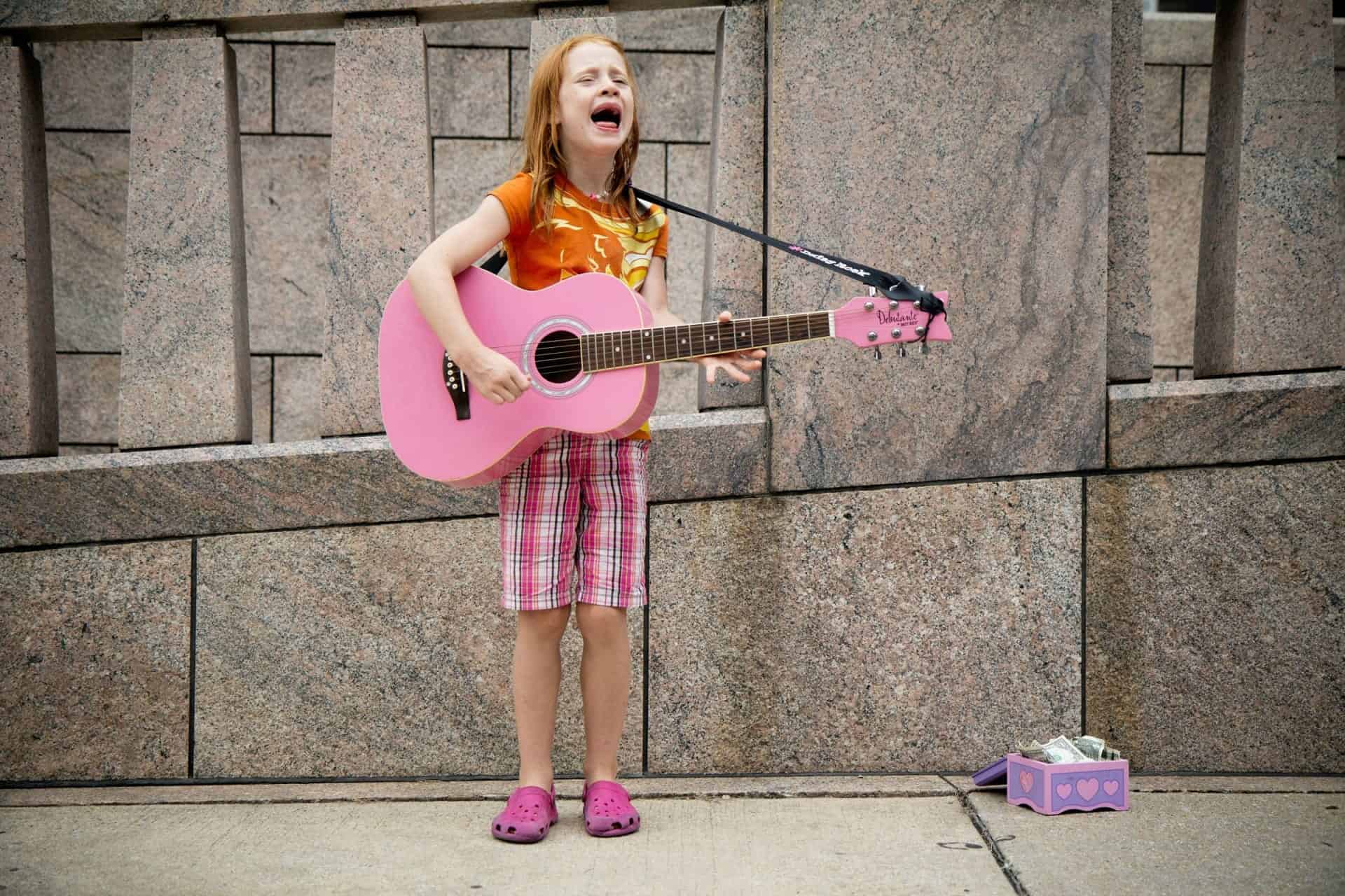 Girl playing guitar