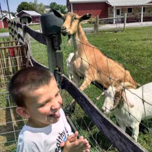 Kevin visiting with the goats at baily's farm.