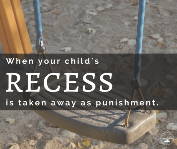School taking away childs recess punishment empty swing at playground